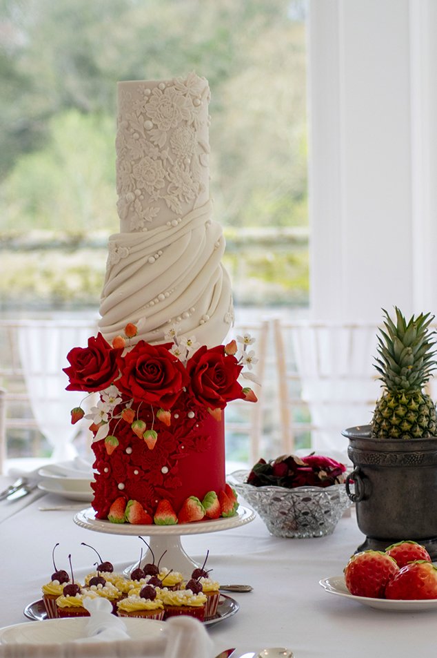 Blueberry Moon Cakes: a photo of a black and white wedding cake. www.blueberrymooncakes.co.uk. Bristol, UK