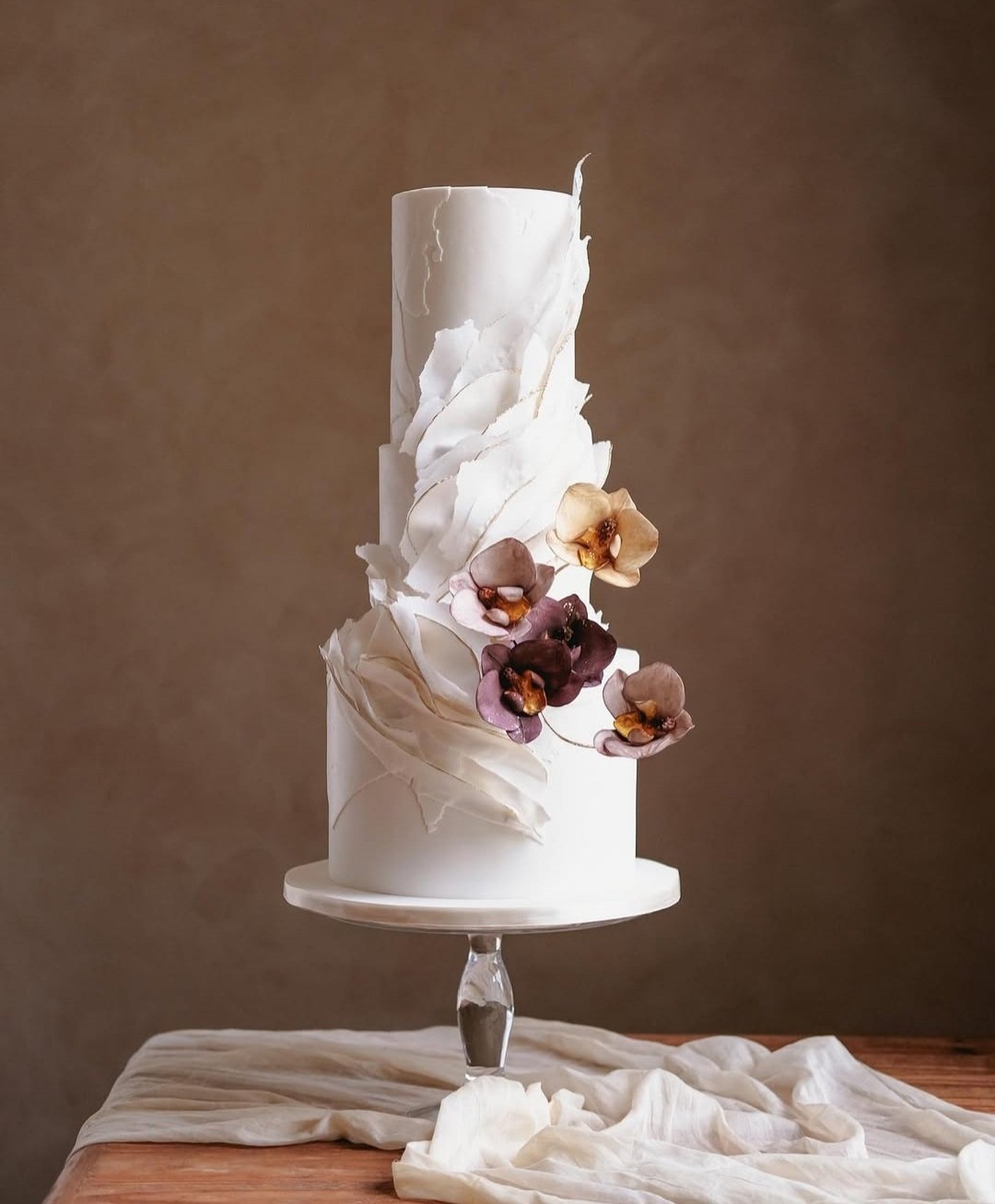 Blueberry Moon Cakes: a photo of a black and white wedding cake. www.blueberrymooncakes.co.uk. Bristol, UK