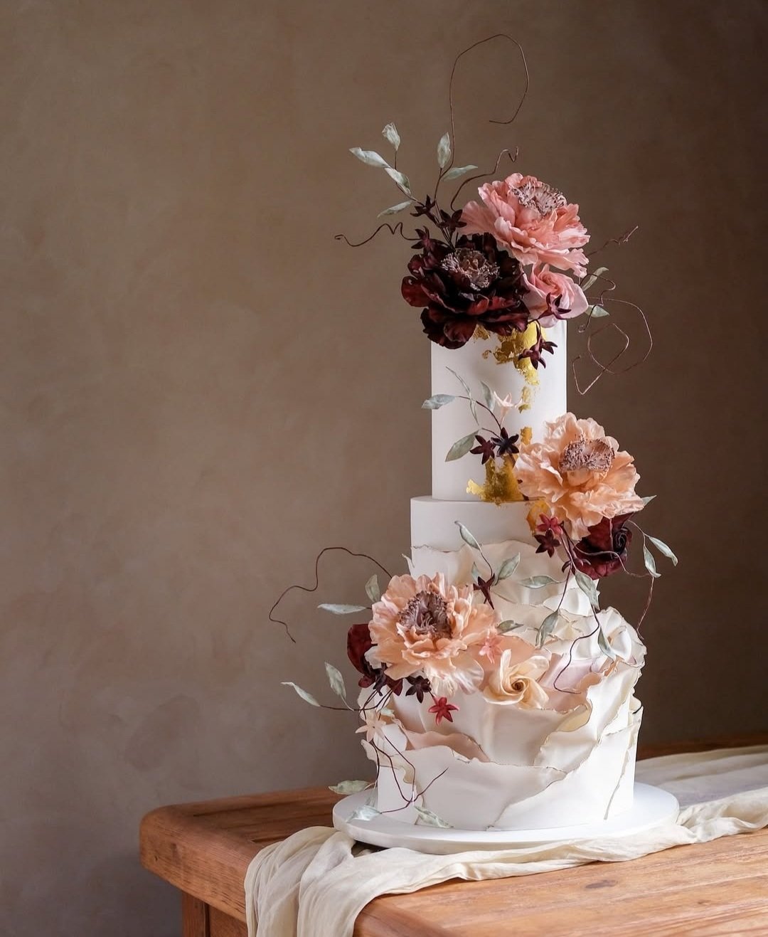 Blueberry Moon Cakes: a photo of a black and white wedding cake. www.blueberrymooncakes.co.uk. Bristol, UK